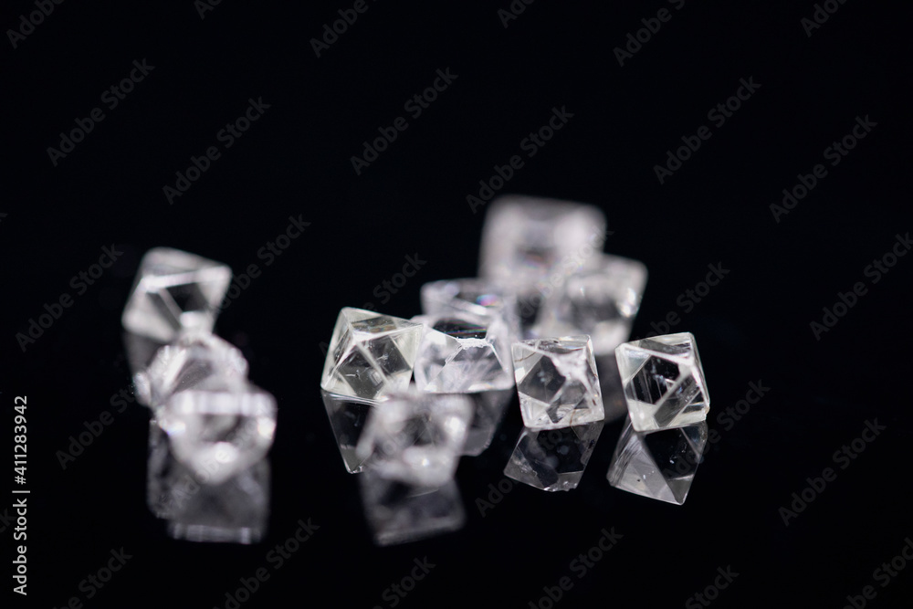 Natural Rough diamonds on black background sorted by size and shapes . High quality photoNatural Natural Rough diamonds on black background sorted by size and shapes . High quality photoNatural