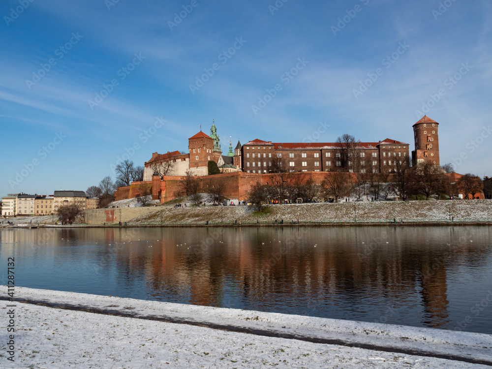 Poland, Cracow - view over Vistula River and Wawel Castle, the biggest attraction of Cracow. Winter time