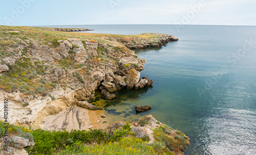 rocky sea coast at the bright summer day