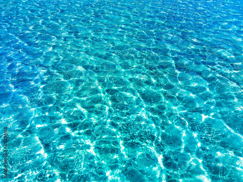 Transparent turquoise blue sea water