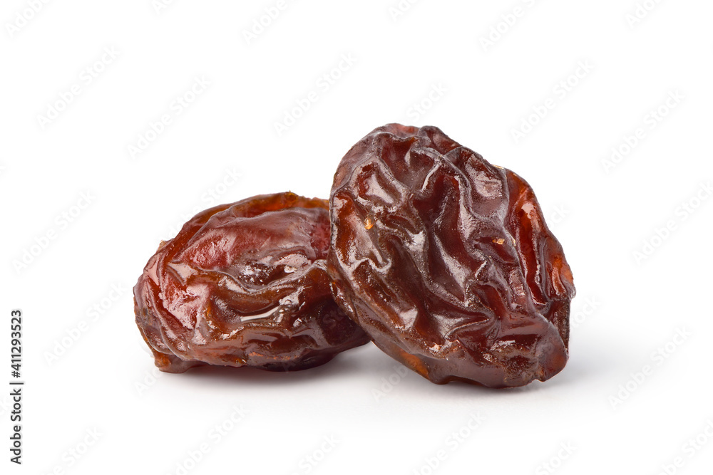 Close-up two Raisins isolated on white background. Clipping path. Close-up two Raisins isolated on white background. Clipping path.