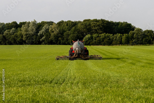 Injection of manure in a pasture photo