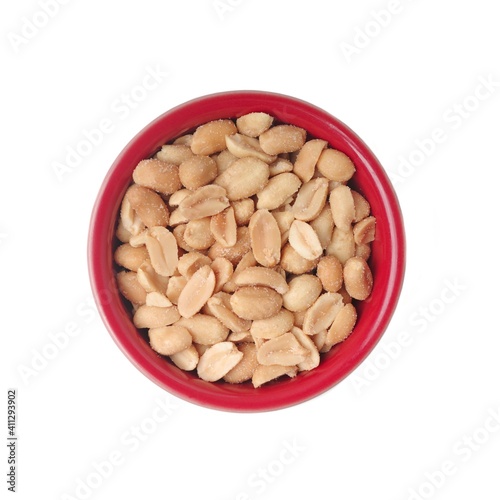 Salted peanuts in a red bowl Isolated on white background. 