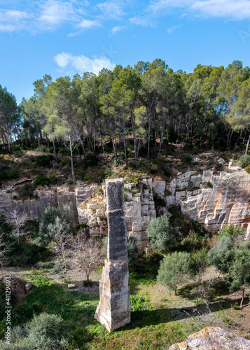 Ancient Roman quarry "El Mèdol" excavated during the period of the Roman Republic and the Roman Empire, at the centre remains a witness column, limestone rock. Tarragona, Catalonia, Spain