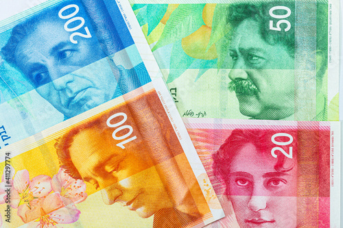 Banknotes of 200 100, 50 and 20 new Israeli shekels close-up. photo