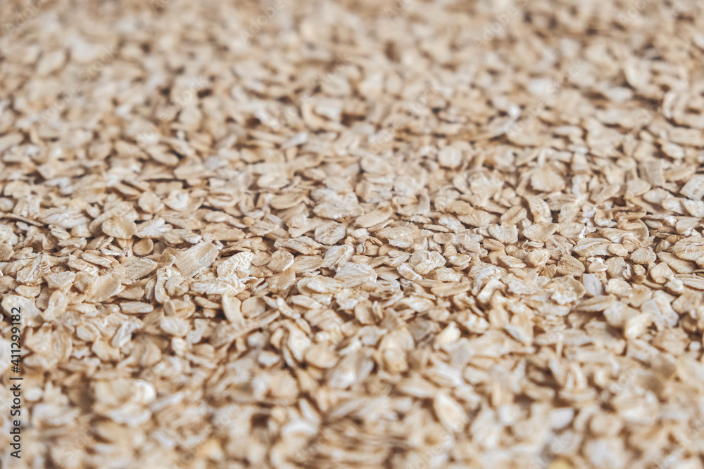 Dry oatmeal as a background texture. Copy, empty space for text Dry oatmeal as a background texture. Copy, empty space for text