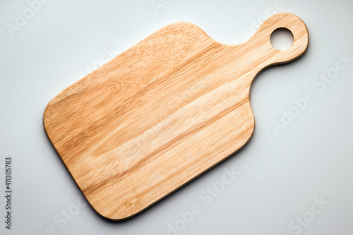 Wooden cutting board with handle, flat lay