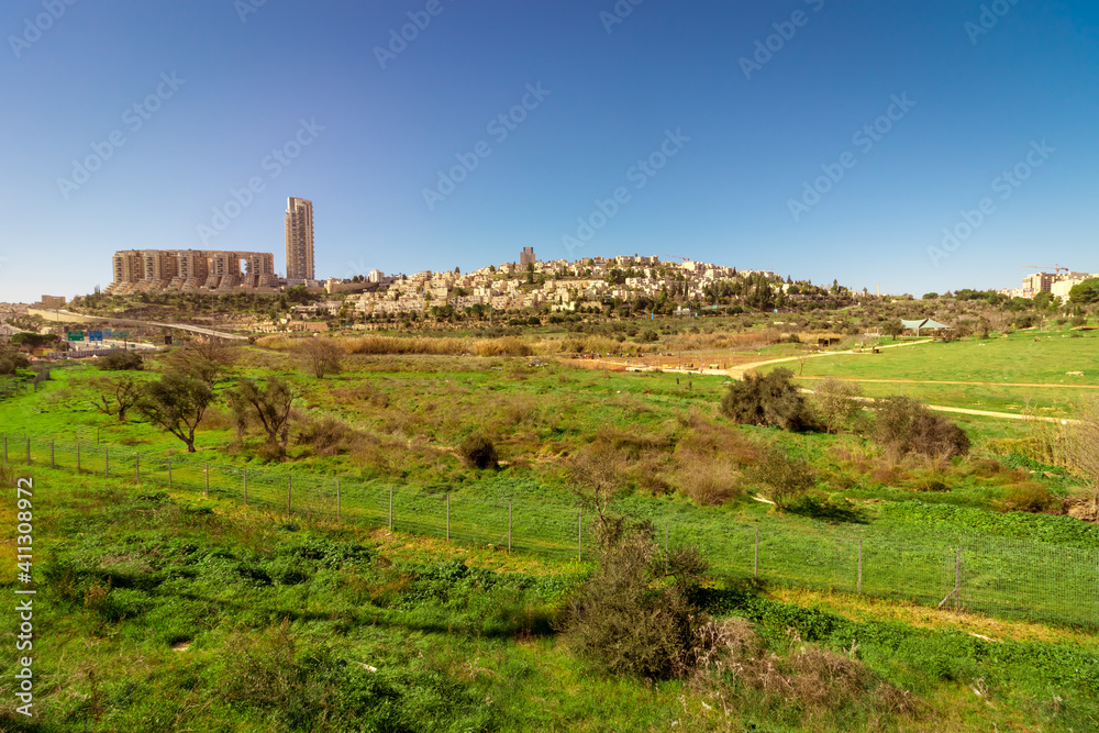 Fototapeta premium Hdr image of the gazelle valley in winter, against the background of the buildings of neighborhoods in Jerusalem