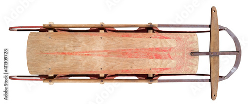 Vintage, faded wooden sled with metal runners. Isolated.