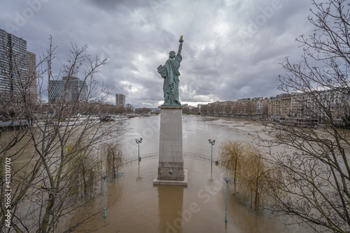 Paris, France - 02 05 2021: View of the Statue of Liberty Paris, from Grenelle Bridge during the Seine flood