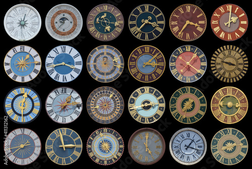 collection of multicolored ancient church tower clocks in different sizes and forms with roman numbers in regular rows on black background