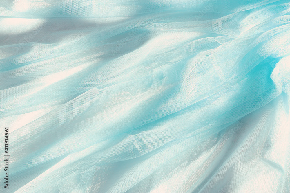 Obraz premium Vintage pastel blue tulle chiffon texture background with shadows