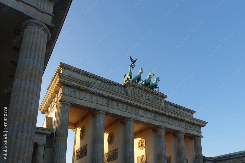Brandenburg Gate in the Mitte quarter of Berlin, Germany. The Brandenburger Tor is an 18th-century neoclassical monument in the German Capital and one of the best known landmarks of Germany