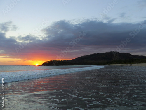 Beautiful sunset at the beach . In the Pacific coast of Costa Rica.