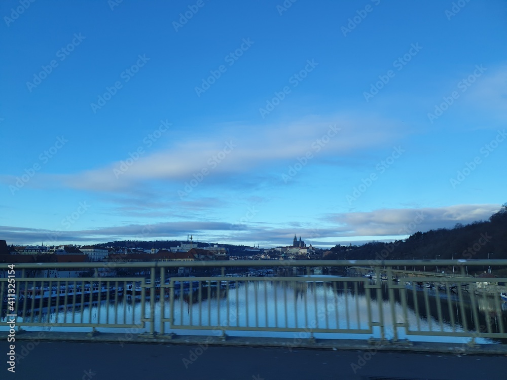 Prague, Czech Republic - December 2019: Lovely scenery and landscape for the river, sea, and clouds in Prague. The view covers many areas in the city.