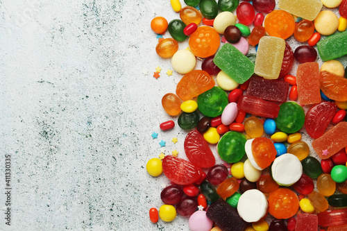 Tapeta Bright candy lollies on white background