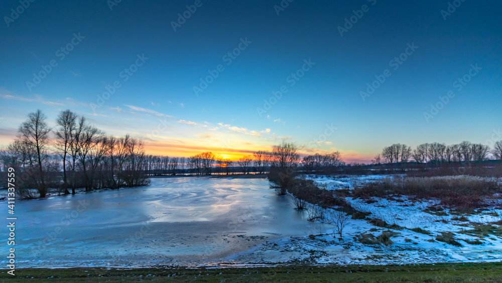 sunset over the Vistula River in the city of Plock