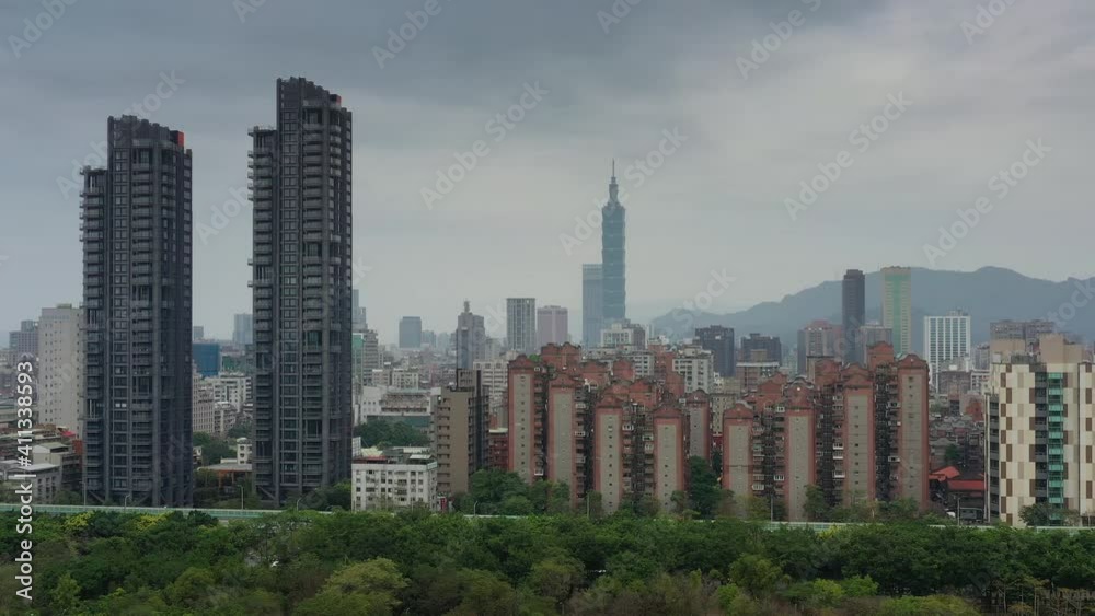 cloudy day taipei city park modern apartment buildings central district view aerial panorama 4k taiwan