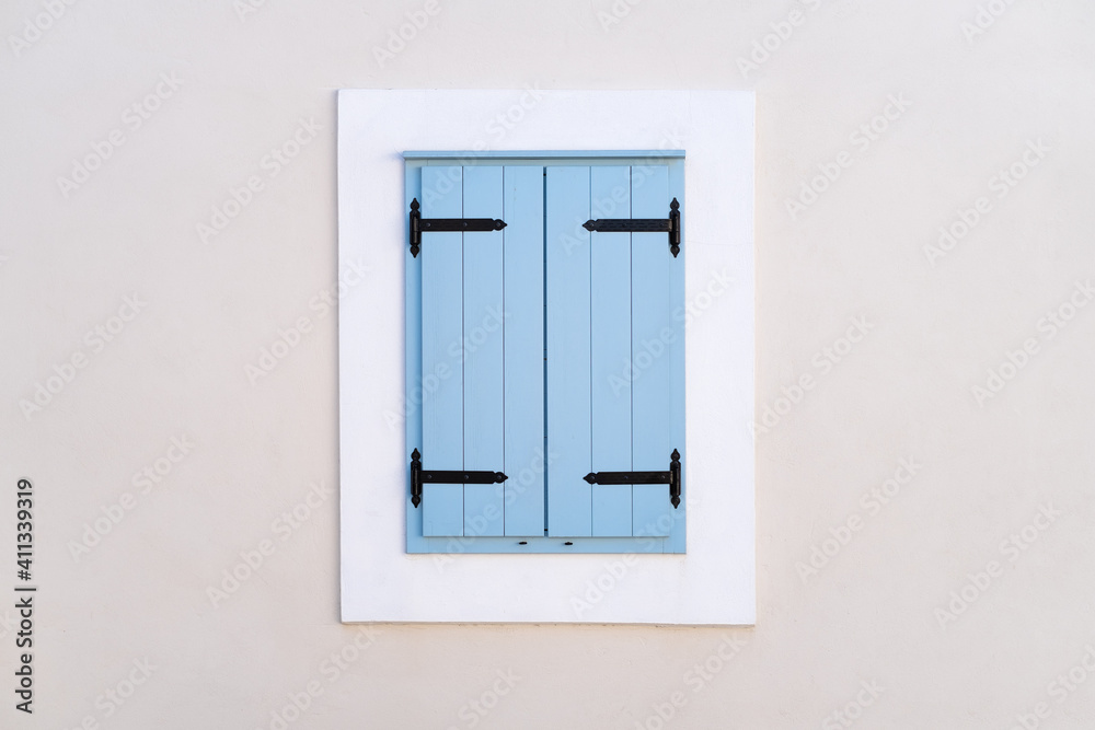 Window with blue shutters. Architectural composition. Closed window. Design and ideas. Window with blue shutters. Architectural composition. Closed window. Design and ideas.