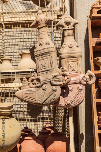 Decorative ceramic khanjar knives for sale at the souk in Nizwa, Oman. photo