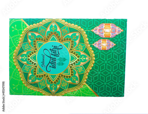 Indonesian money, rupiah / IDR in envelopes with THR Text. THR is a holiday allowance at Iedul Fitri or Eid. photo