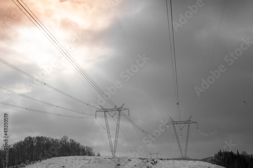 Electricity pylon under winter sky