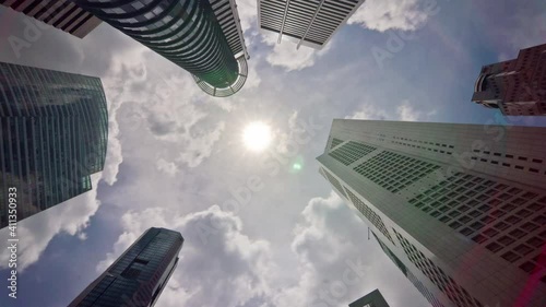 sunny day singapore city downtown up view panorama 4k timelapse photo