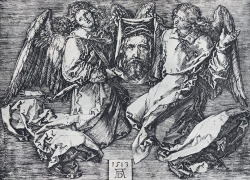 BERNOLAKOVO, SLOVAKIA, DECEMBER 29, 2016: The Lithography of Holy Face of Jesus among the angels by Albert Dürer (1471 - 1528) printed in Germany (1928). photo