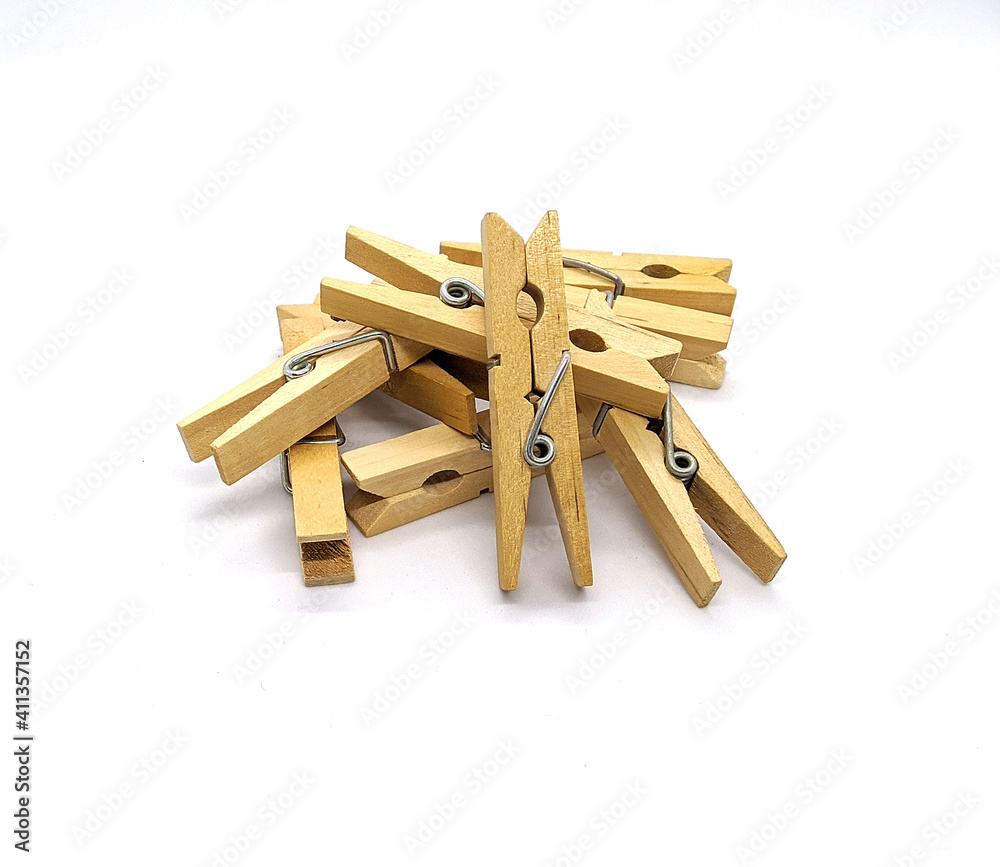 clothespins. wooden clothespins on a white background side view clothespins. wooden clothespins on a white background side view