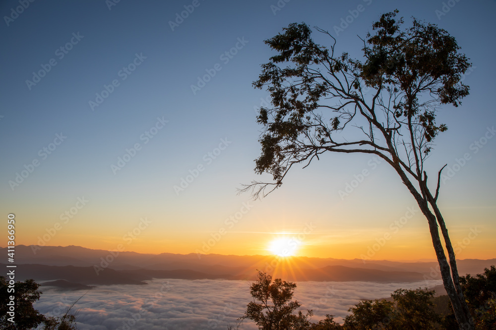 Sunrise time with sea of fog and clouds with mountain hill at Sri Nan National Park Doi Samer Dao Nan Province Thailand, Asia. Sunrise time with sea of fog and clouds with mountain hill at Sri Nan National Park Doi Samer Dao Nan Province Thailand, Asia.