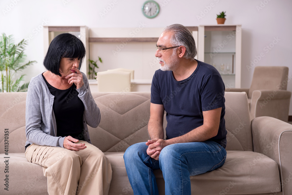 Old couple having argument at home Old couple having argument at home