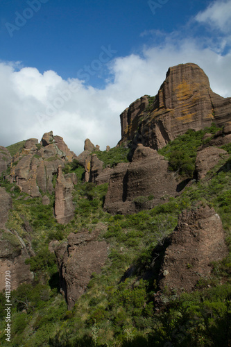 Exotic rocky formations. View of the mountains, green forest and rock formations called Los Terrones, in Cordoba, Argentina.