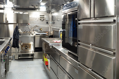 Restaurant kitchen with chr...