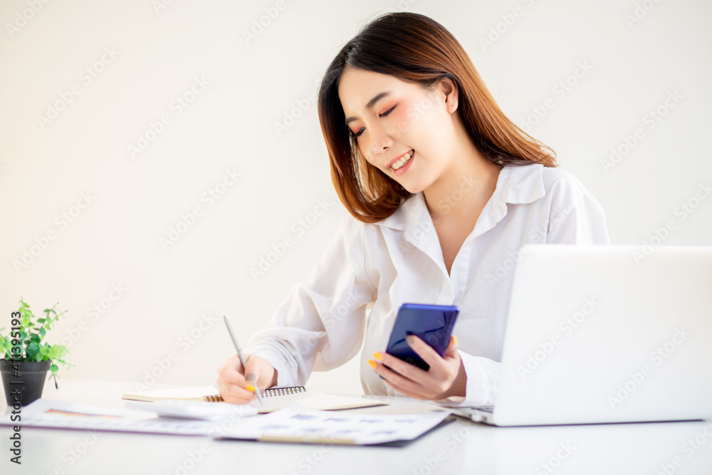 Portrait of Beautiful young woman working on laptop computer, woman work from home .
Portrait of Beautiful young woman working on laptop computer, woman work from home .