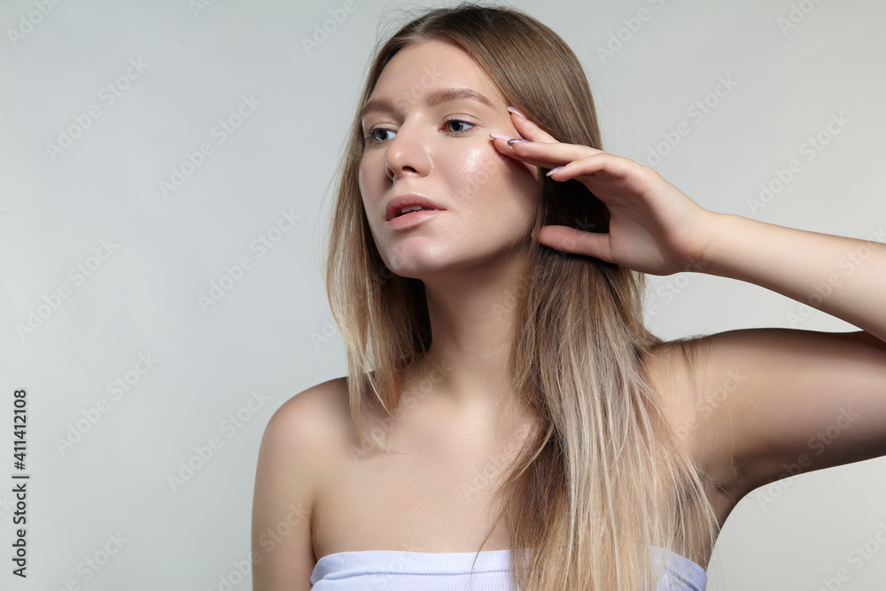 Fototapeta premium Portrait of young blonde woman.