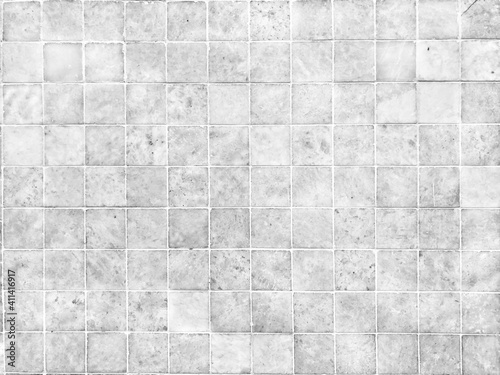 White slate ceramic tile wall for abstract seamless background and texture.