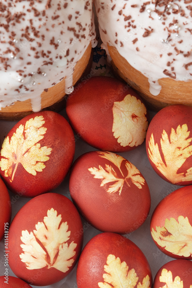 Fototapeta premium Orthodox Easter. Easter cakes and colored eggs. Traditional Kulich, Paska Easter Bread. Top view. Closeup