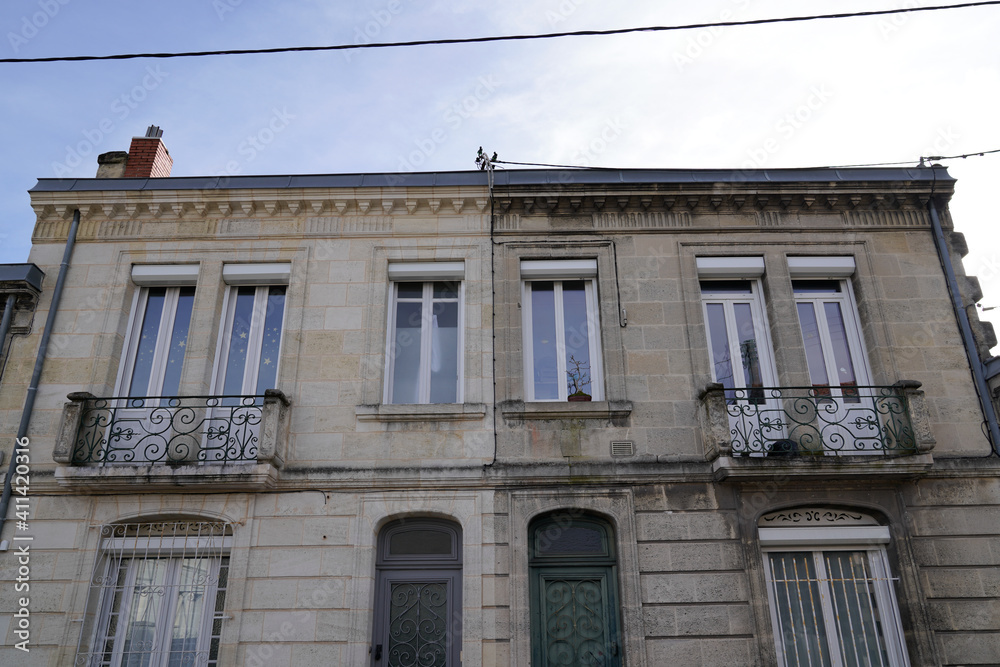 Fototapeta premium Difference between ancient wash cleaned old house building facades and a dirty one before and after