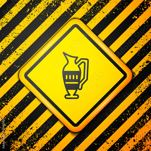 Black Ancient amphorae icon isolated on yellow background. Warning sign. Vector.