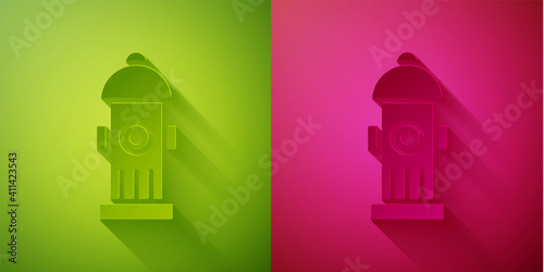 Paper cut Fire hydrant icon isolated on green and pink background. Paper art style. Vector.