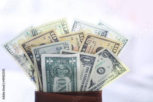 Group of money stack of 100 US dollars banknotes a lot of the background texture. Cash money in a large pile as a finance background.
