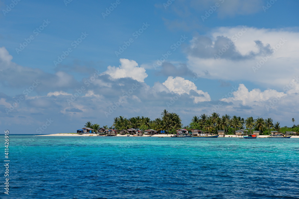 Malaysia. Coconut palms at numerous reef Islands near the island of Borneo near the town of Semporna