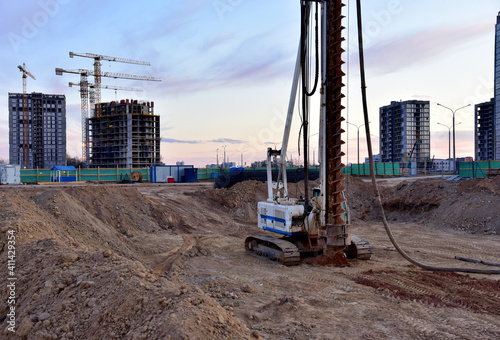 Vertical tamrock pile foundation drilling machine. Drill rig at construction site. Ground Improvement techniques, vibroflotation probe. Vibro compaction method. Piling Contractors