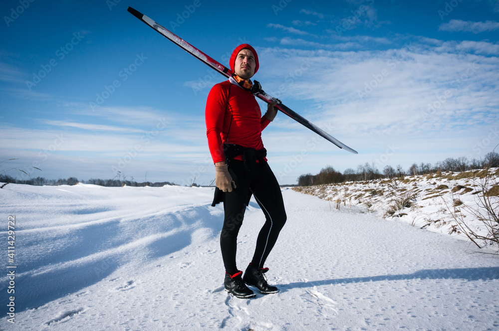 portrait of a skier, skiing in the countryside portrait of a skier, skiing in the countryside