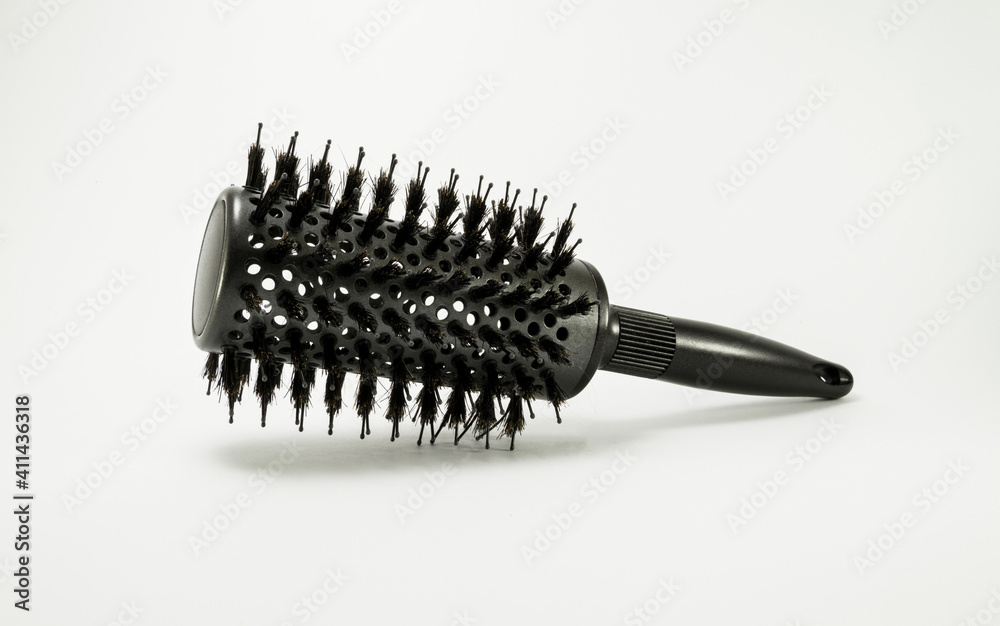 Round hair brush isolated on white background. Round hair brush isolated on white background.