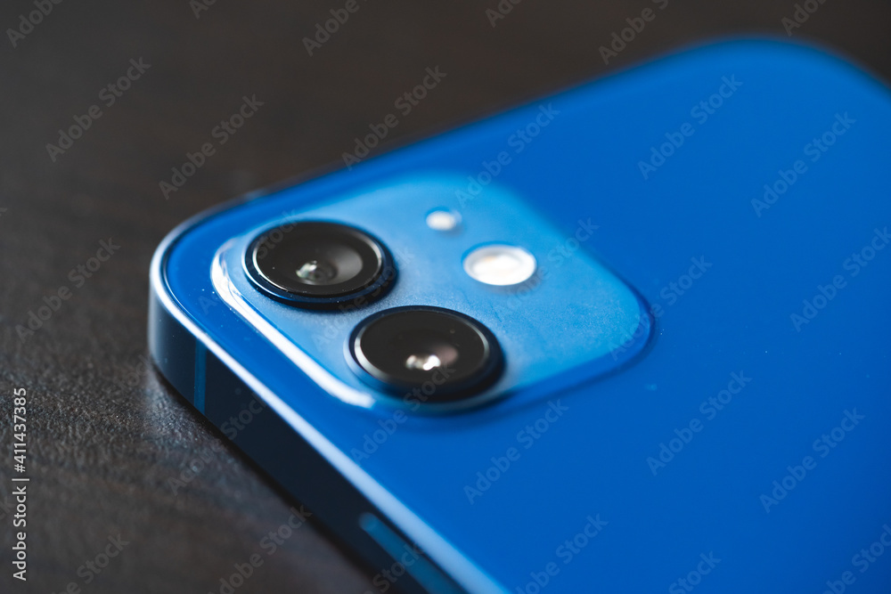 February, 2021: Back view of new blue smartphone. Two lens close up. February, 2021: Back view of new blue smartphone. Two lens close up.