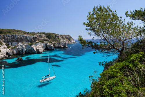 Fototapeta Naklejka Na Ścianę i Meble -  Beautiful bay with sailing boats, Menorca island, Spain.