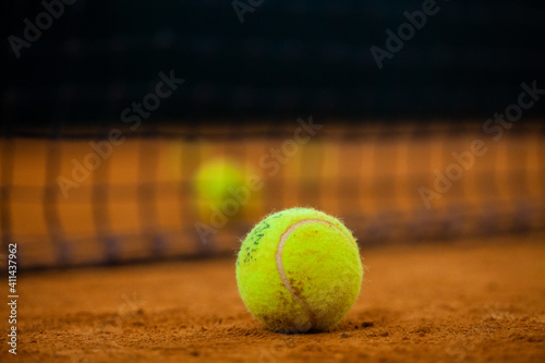 Tennis balls on the tennis court. Tennis game. Sport, recreation concept © Dmitry