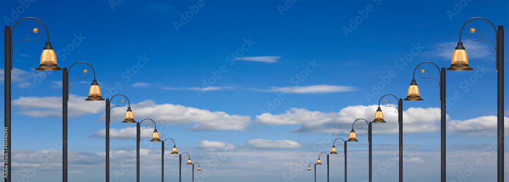 street lampost on cloudy sky background street lampost on cloudy sky background