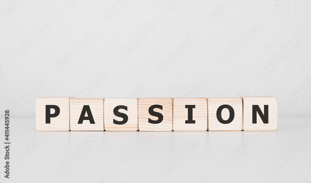 Word PASSION written on wood block. Business concept
